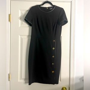 DKNY black dress with faux leather trim, and metal buttons. Sz 8.